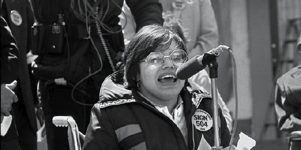 Judy Heumann advocating for the signing of regulations implementing Section 504 of the Rehabilitation Act